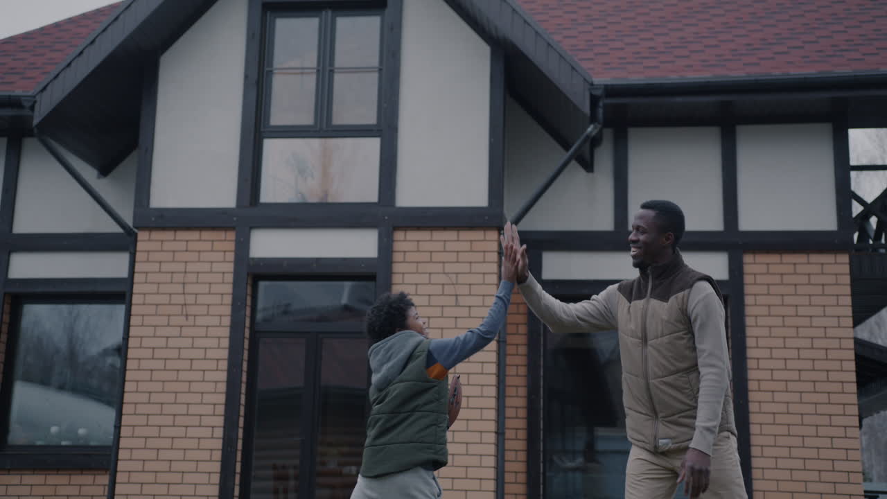 Father and Son Playing Baseball