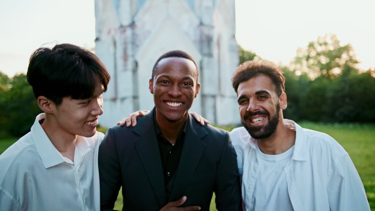 Three Diverse Men Enjoying Friendship Outdoors