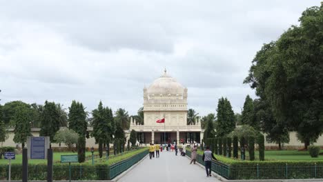 a wide angle view of the beautifully landscaped 'gol gumbaz' mausoleum built in mughal architecture style is an important pilgrimage of islam religion in  karnataka, india.