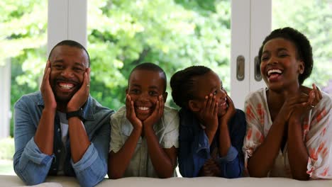 Parents-and-kids-having-fun-in-living-room