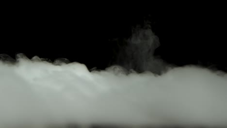terrible mummy hand rising out from the smoke at black background. slow motion