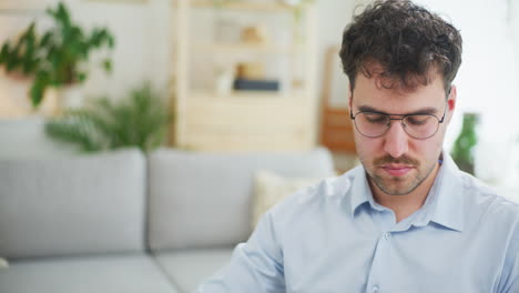 Portrait-of-a-Confident-Businessman-Working