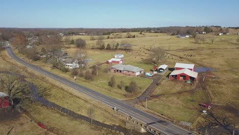 aerial view of ranch homes and ranch operations beside the fhighway in the back country