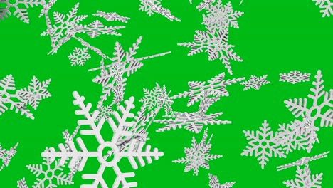 copos de nieve cayendo sobre la pantalla verde.