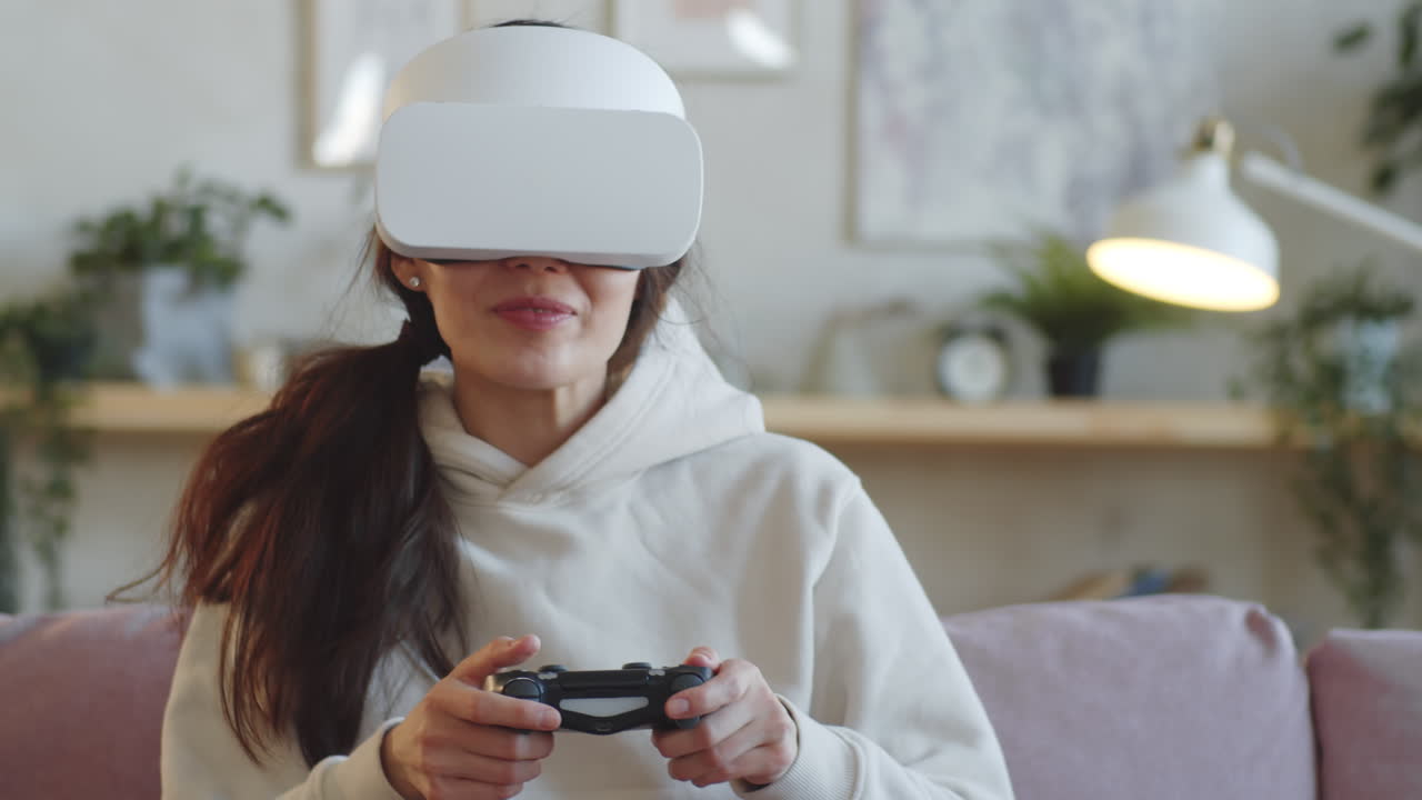 Woman in VR Headset Playing Video Game with Gamepad