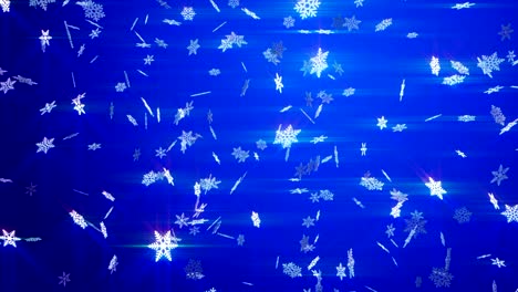 snowflakes falling on blue background.