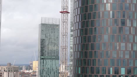 modern architecture of deansgate square luxury residential towers, aerial riser