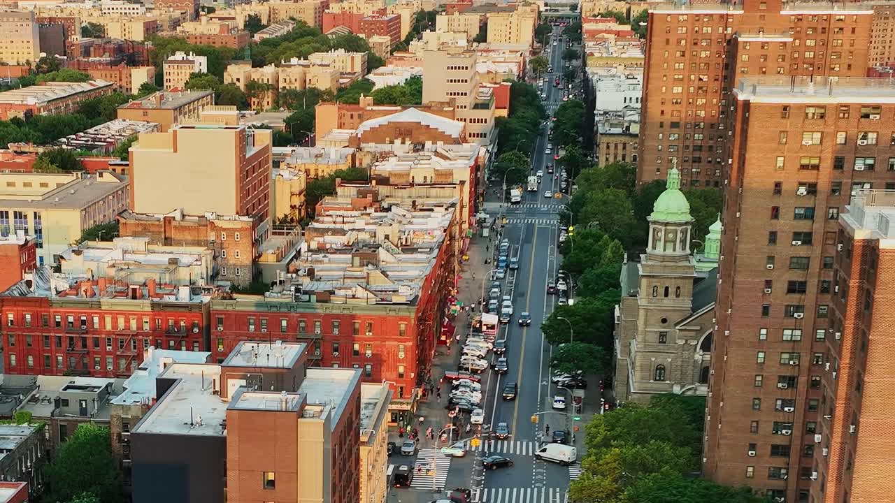 Drone view of urban life in New York City during sunset