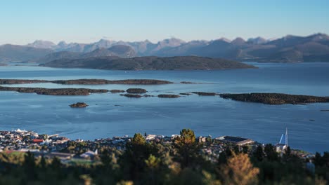 a timelapse of the sunset above the molde harbour