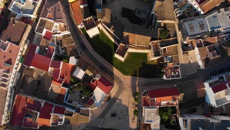 top down shot of rooftops of a historic city in algarve, portugal