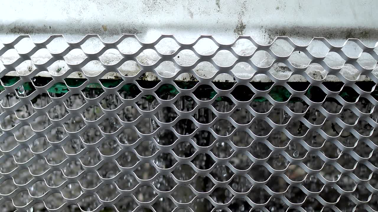 3 phase induction motor. The function is to drain or pump water. The exterior is old and rusty. Close up on net.