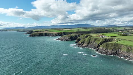 establishing shot of the copper coast drive waterford ireland on a summer day
