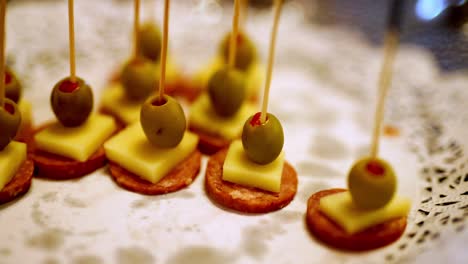 olive and pepperoni appetizer on toothpick, savory temptation