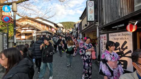 crowded street with people in kimono and modern attire