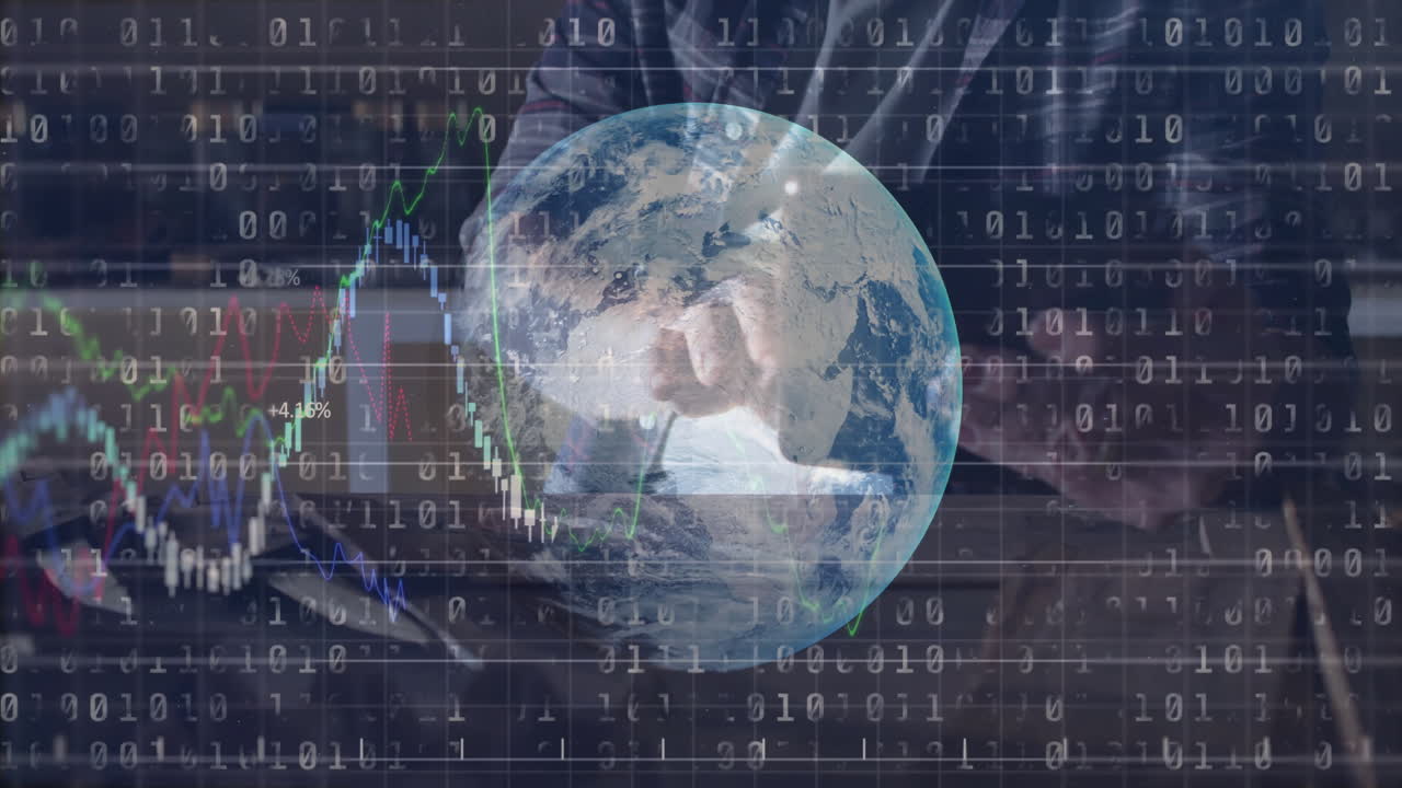 Man typing on laptop at desk, overlaying digital globe, streaming binary code and stock charts
