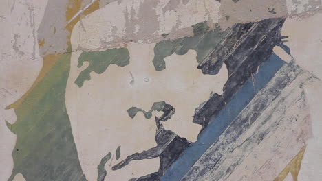 close up of a faded mural portrait
