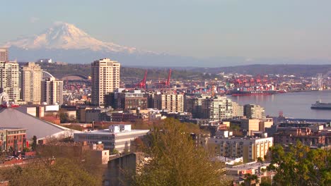 A-ferry-boat-arrives-in-Seattle-harbor-on-a-beautiful-clear-day