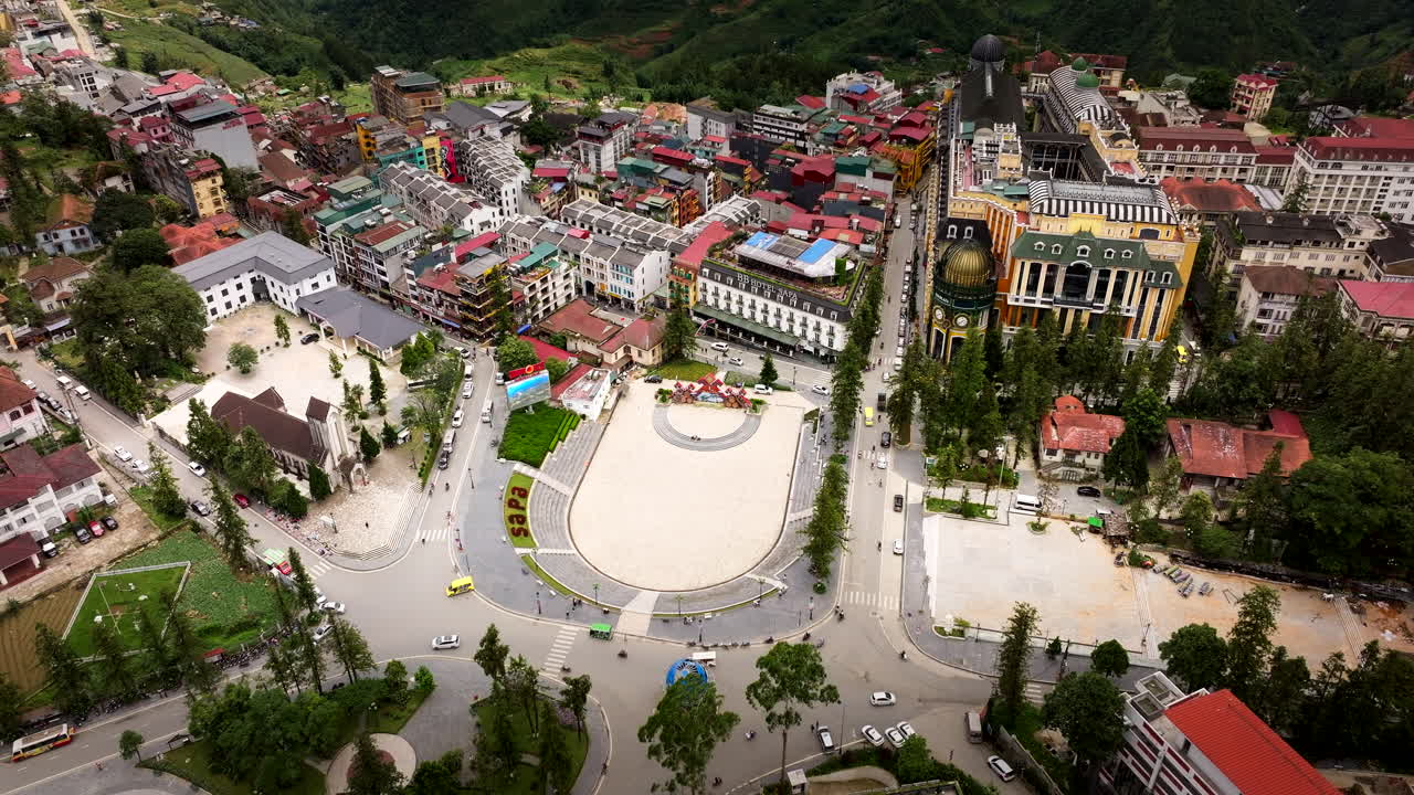 Aerial view of popular Sa Pa Center with traffic flow in daytime, Vietnam