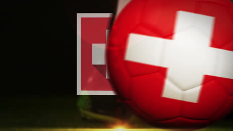 football player kicking switzerland flag ball