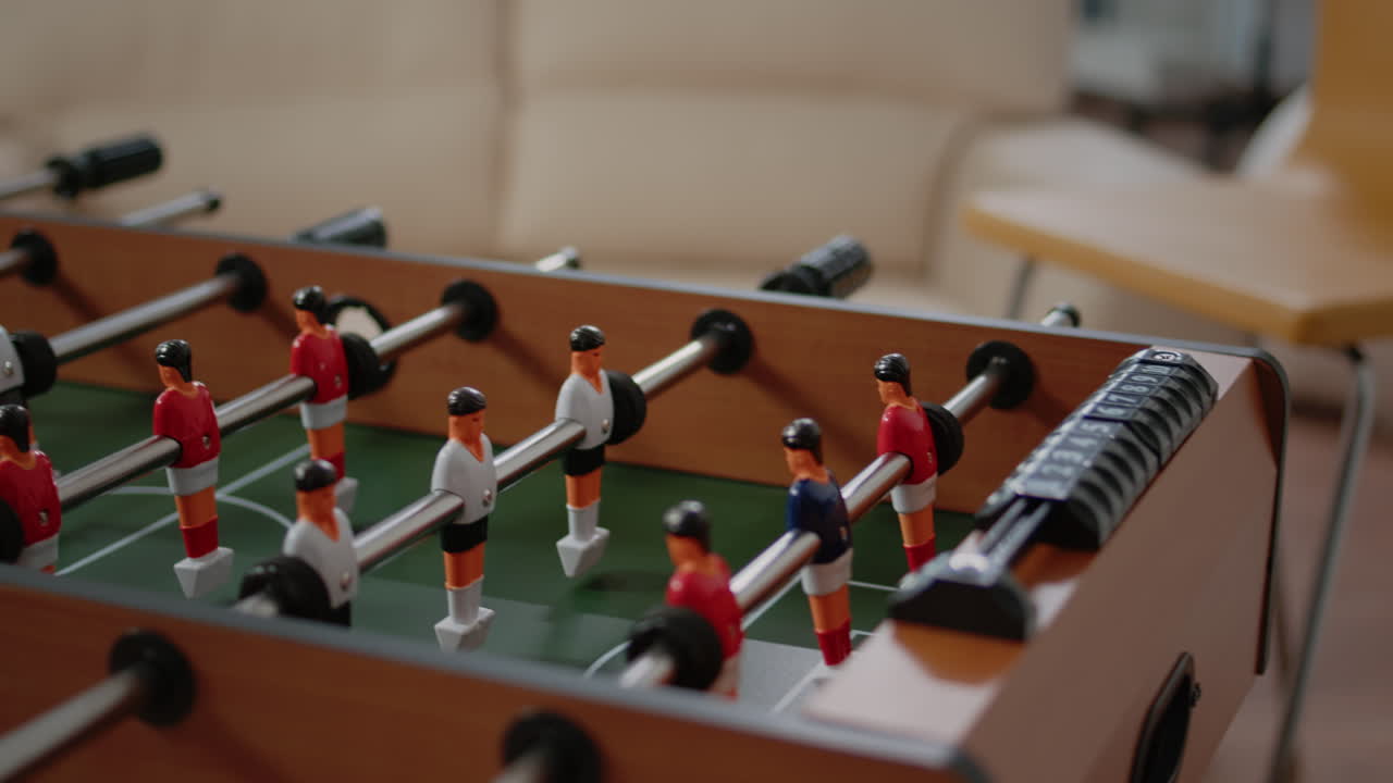 Close up of foosball game table to do fun activity and entertainment