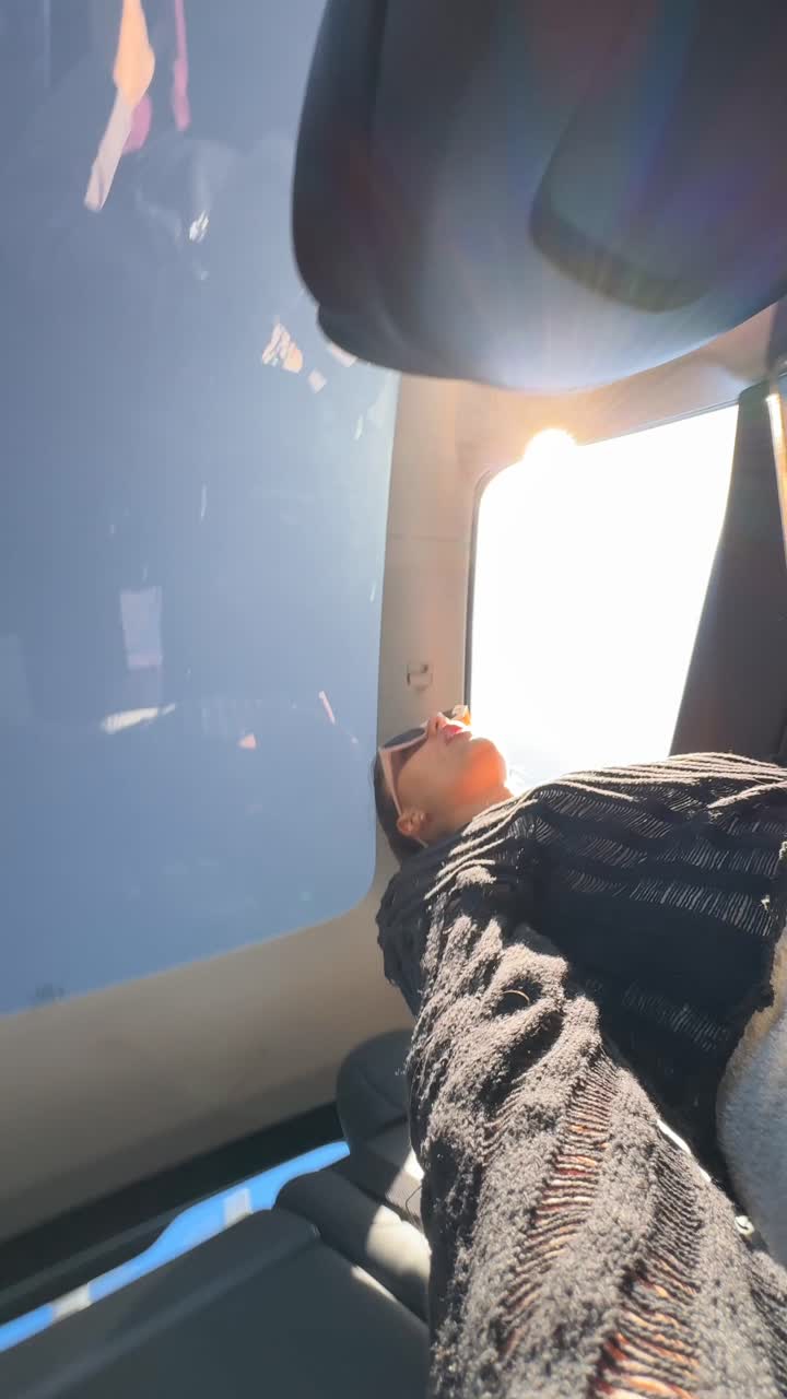 Woman enjoying a scenic journey in a car and helicopter