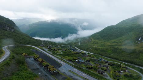 drone view of røldal ski center on rainy summer day
