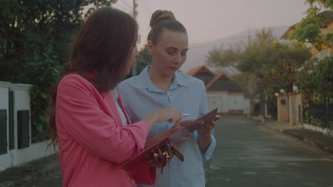 real estate agent discussing property with client
