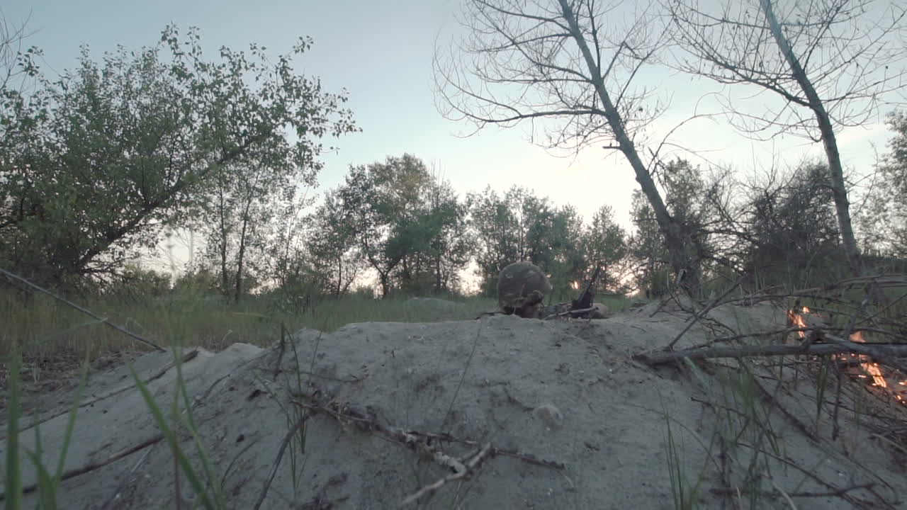 Military Personnel in a Forest during Combat Exercise