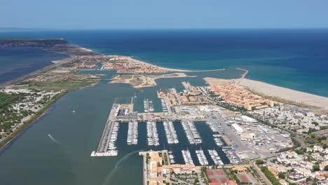 large aerial shot over port leucate mediterranean sea sandy shore sunny day