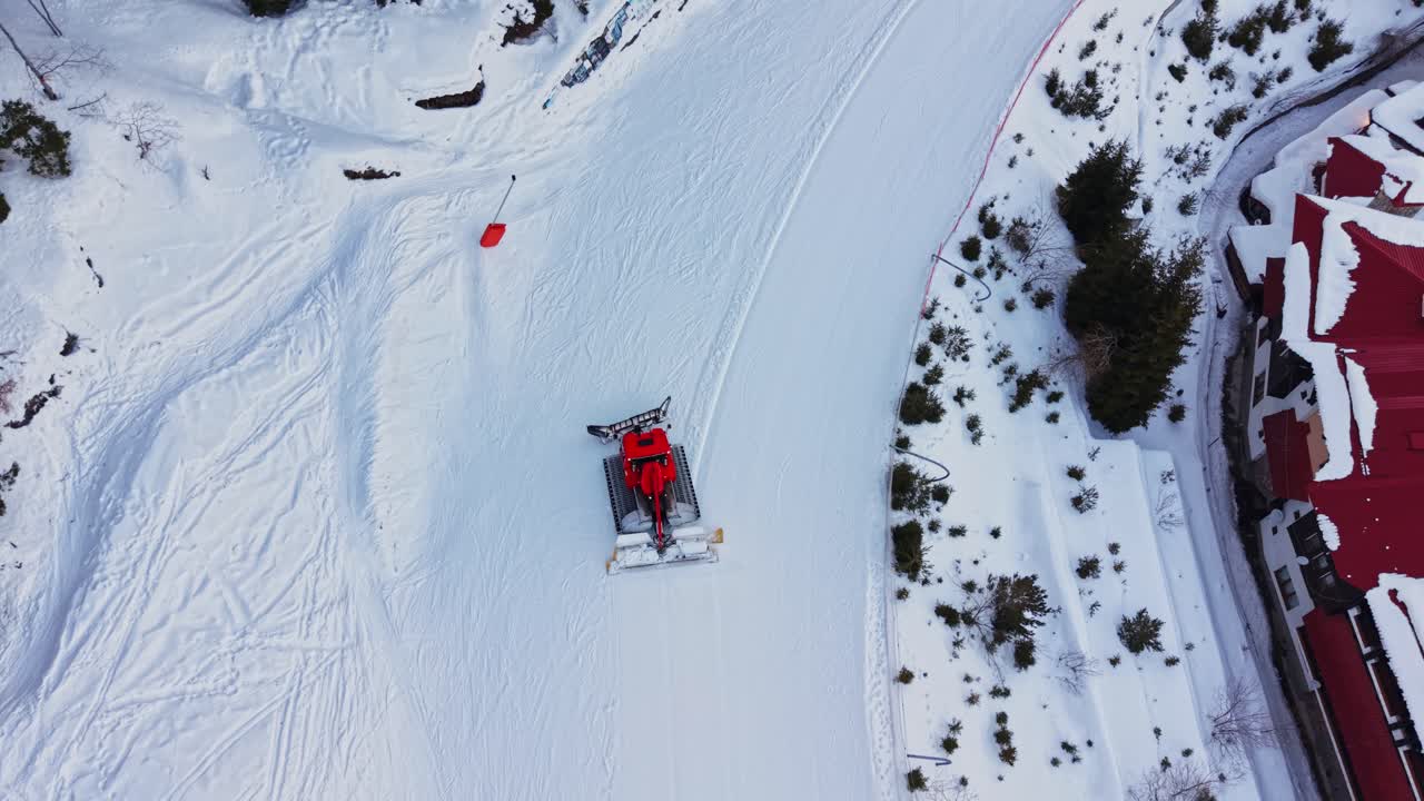 Snow grooming equipment prepares the slopes in the Carpathians, Bulgaria