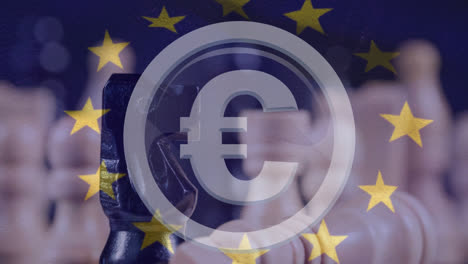 euro currency symbol over eu flag waving against chessboard