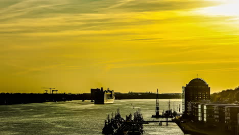 video in timelapse of queen mary 2 leaving the harbour in hamburg,germany 2013. golden hue of the setting sun in germany.