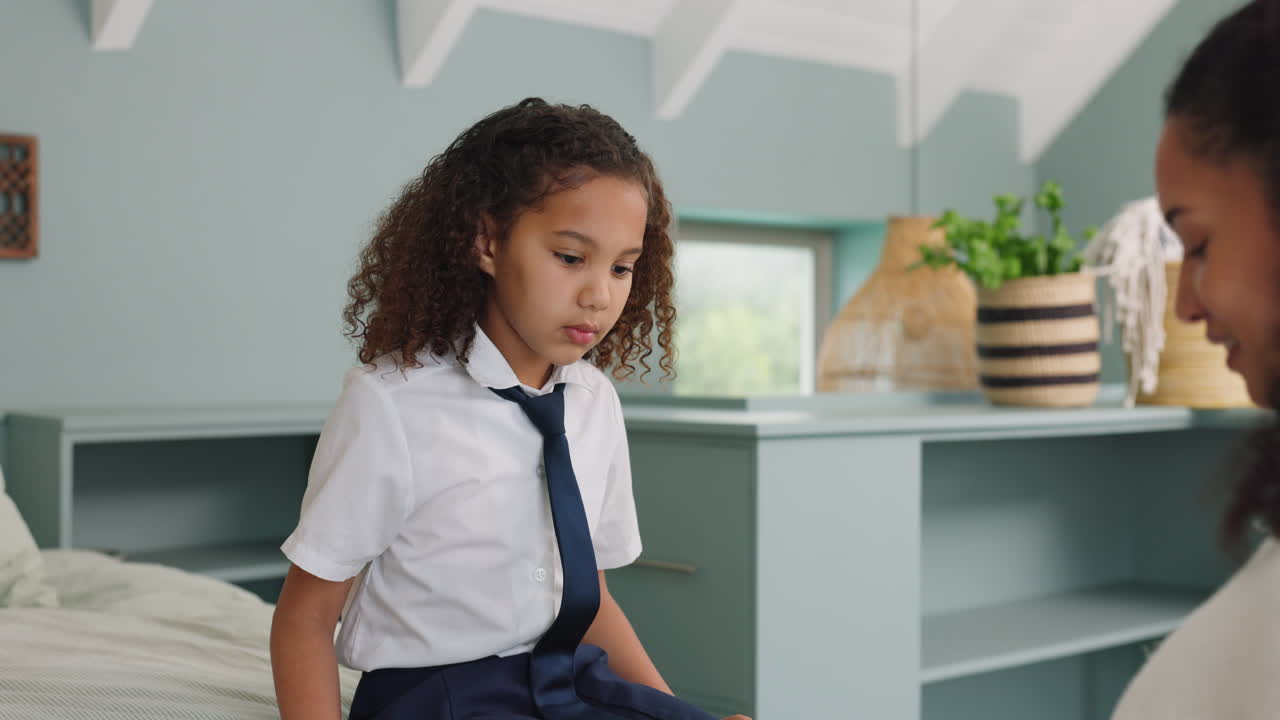 Mother Helping Daughter Get Ready for School
