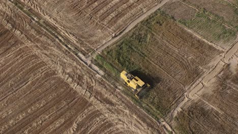 Static-shot-of-a-tractor-in-the-field