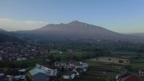 sunrise over the outskirts of batu city, indonesia
