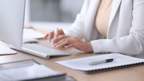 woman sending emails, doing research