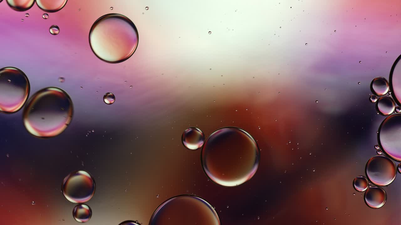 Abstract Colorful Food Oil Drops Bubbles and spheres Flowing