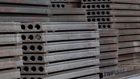 stacks of concrete blocks. reinforced concrete slabs inside the industrial plant. production of building materials on a concrete manufacturing.