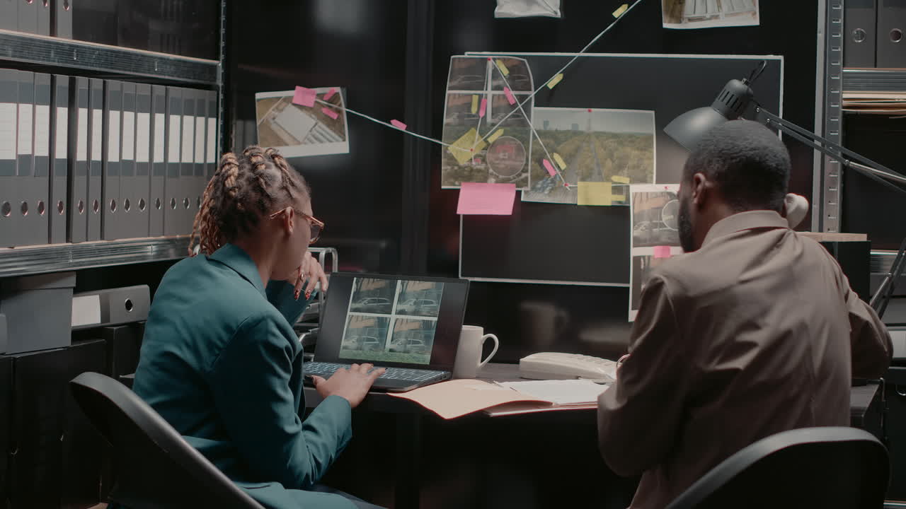 Detectives Working on a Case in a Police Office