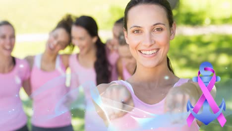 animation of pink ribbon anchor logo and blue wave over diverse group of smiling women