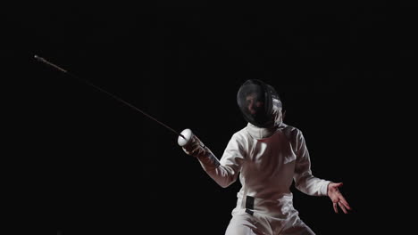 a fencer in action