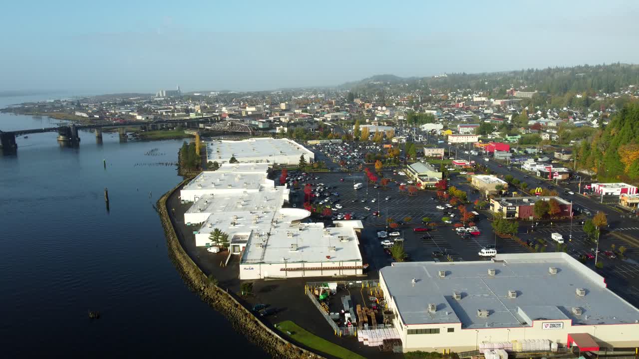 US, WA, Aberdeen, 2025-10-29 - Drone view of big box stores