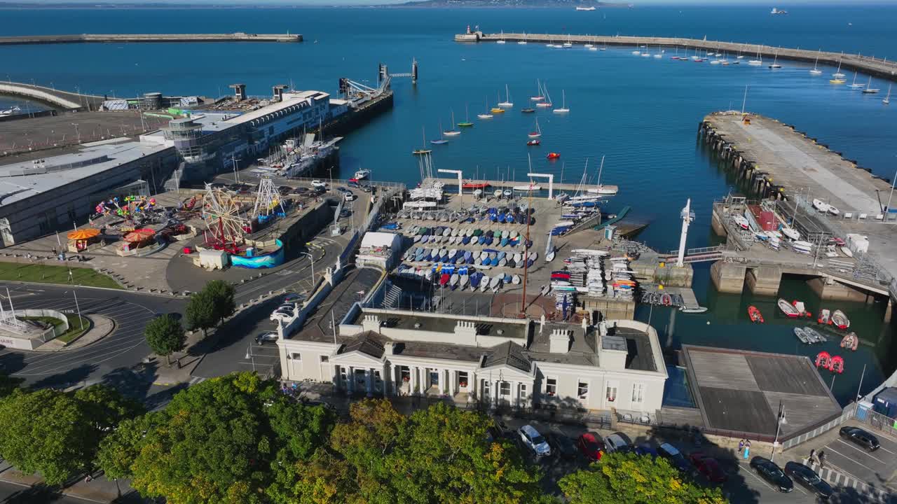 Aerial View of a Harbor with Boats and a Funfair