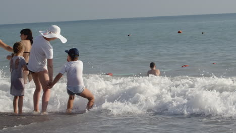 family enjoying a beach day