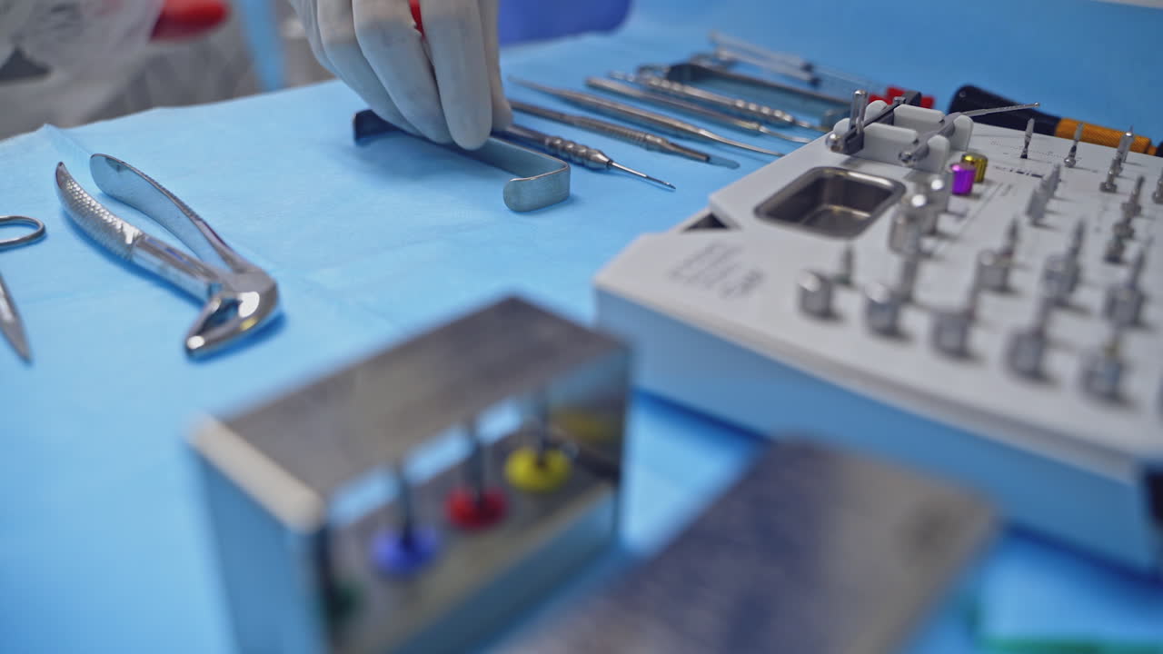 Modern professional equipment in dentistry. Preparing to work. Medical tools for teeth treatment on the table. Dentistry concept.