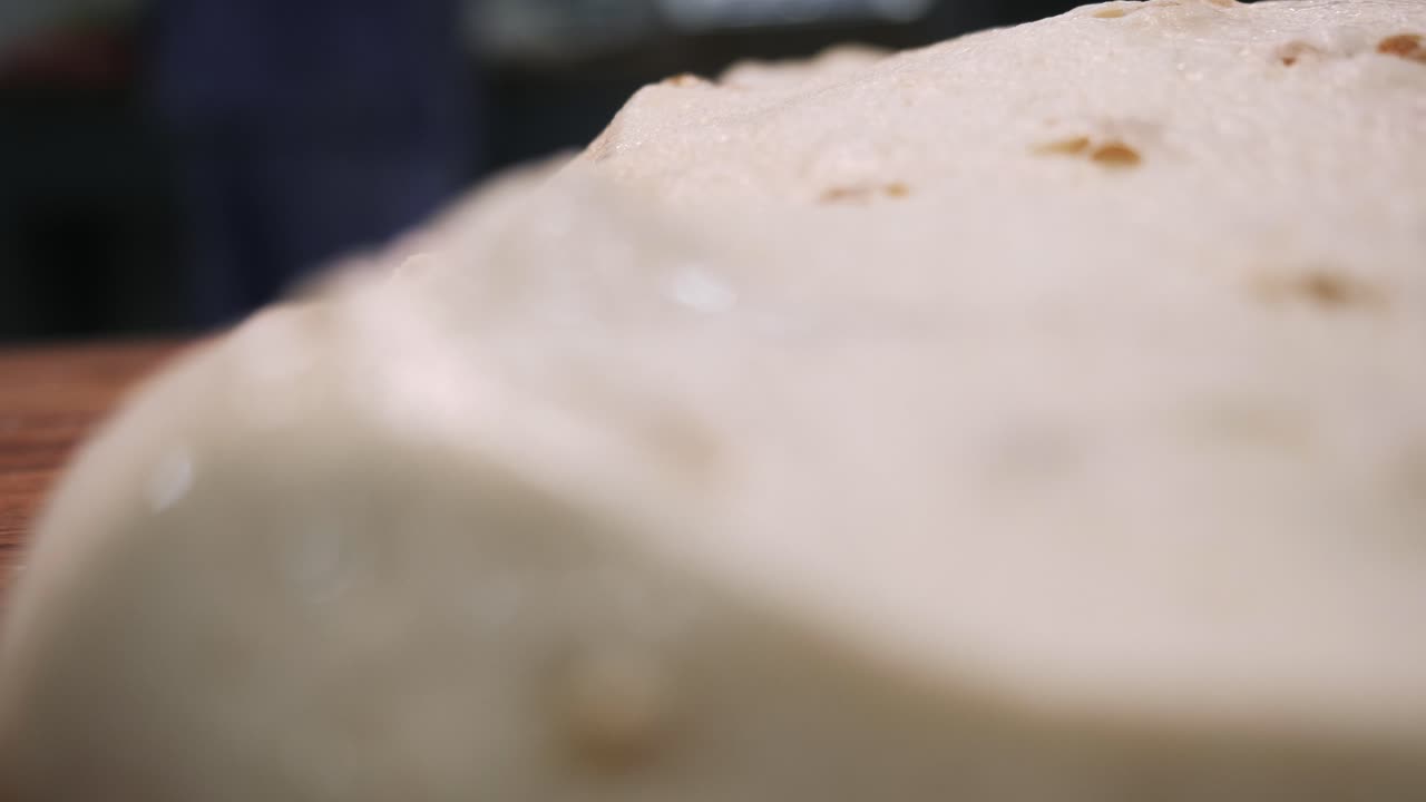 Close up of unbaked dough on a cutting board