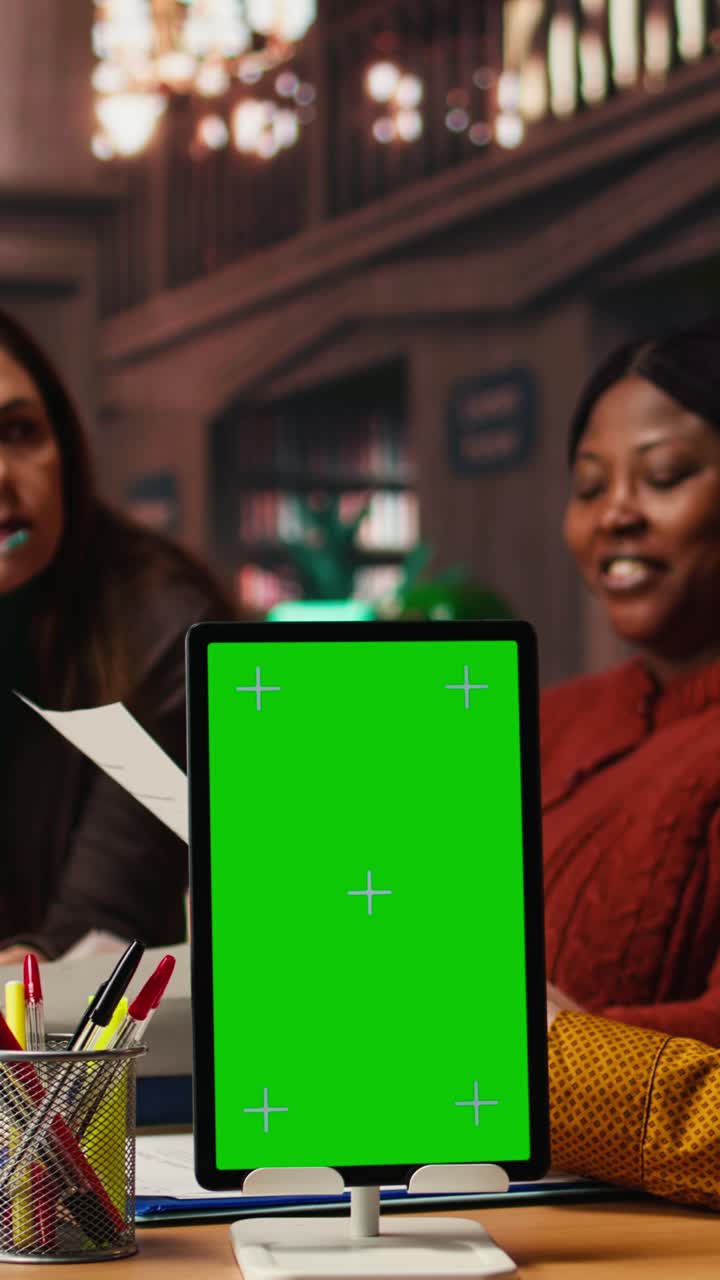 Vertical Video Diverse team immersed in dramatic arts rehearsal with chroma key