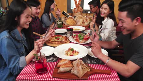 friends enjoying a delicious italian meal