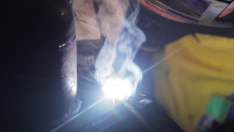 Electric-arc-welding-machine-with-hand-hold-gun.-Electric-arc-welding-is-shown-in-close-up.