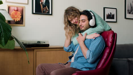 Young-man-listening-to-music-at-home